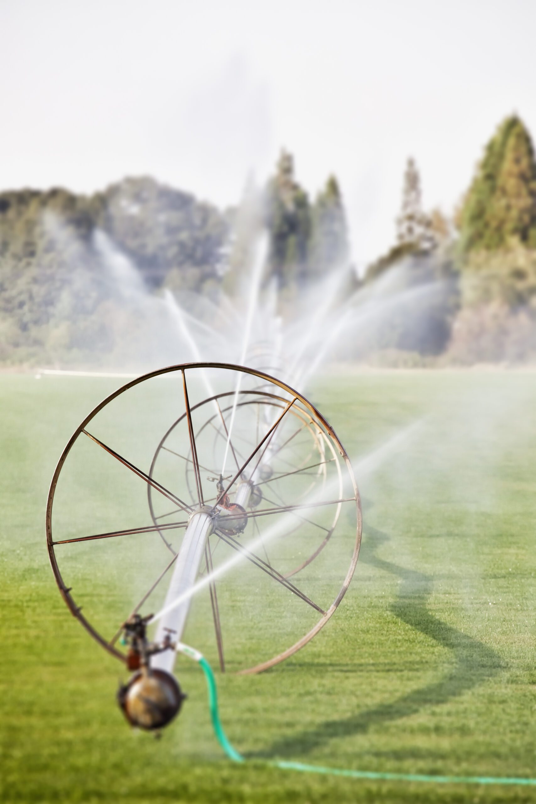 Agricultural irrigation system powered by diesel generator in a British farm field